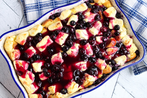 Blueberry sauce poured over the french toast casserole.