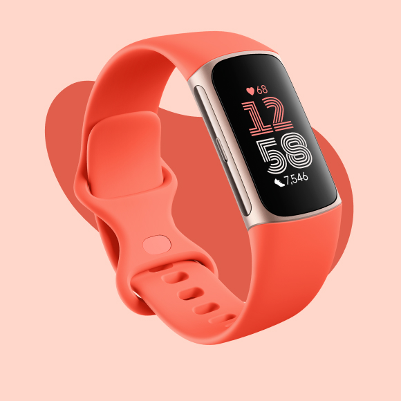 The Fitbit Charge 6 in the color Coral.